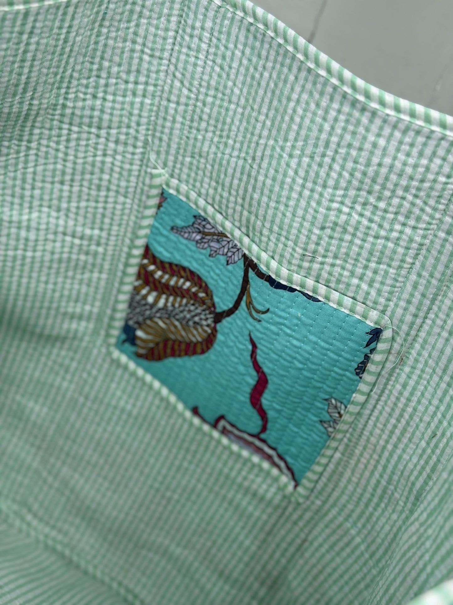 Quilted bag - turkis med blomster